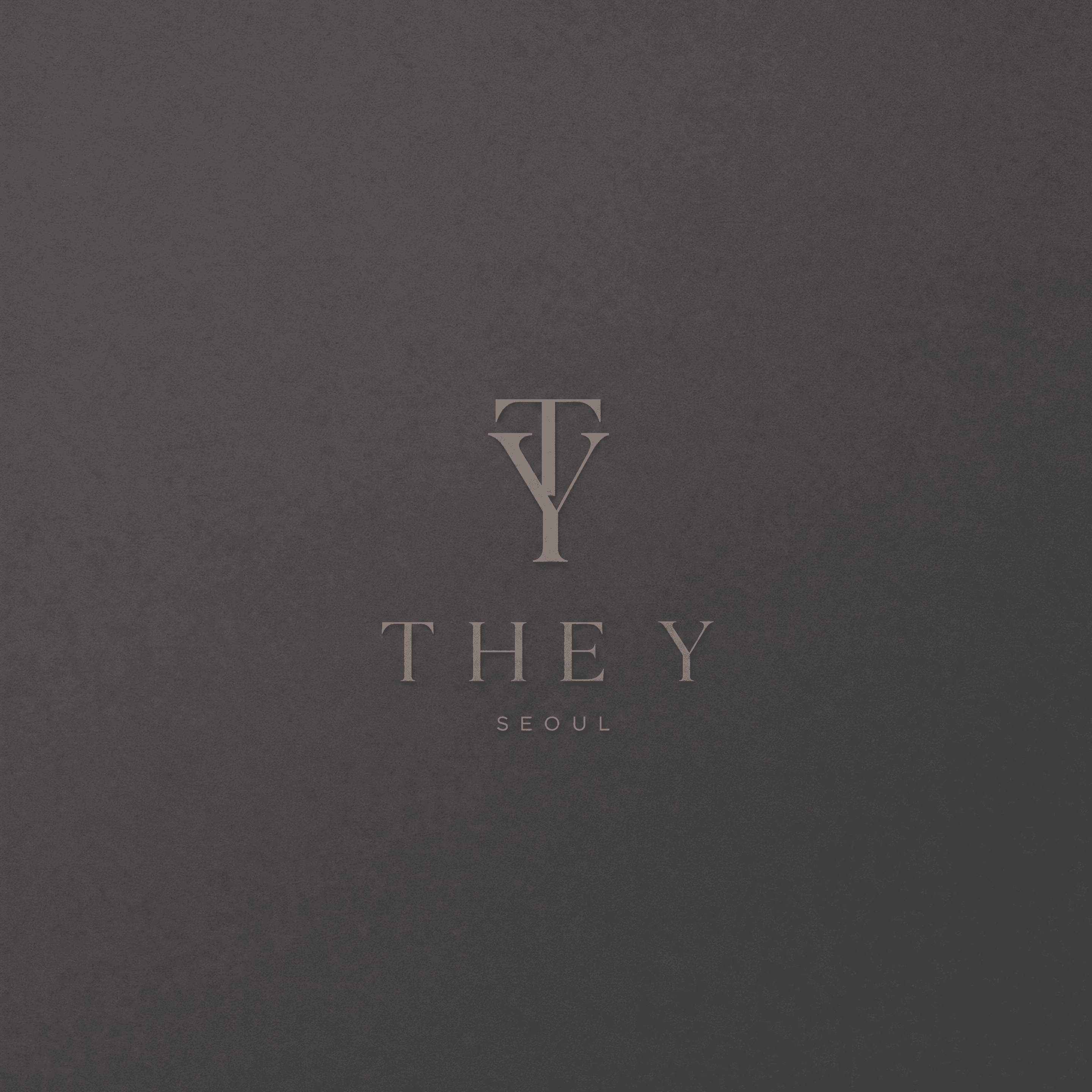 THE Y brand mark